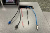 Pedestal - laptop cable connections with cables pulled out showing cable ends