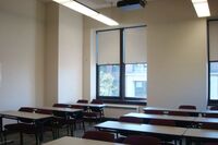 Rear of room view of student table and chair seating