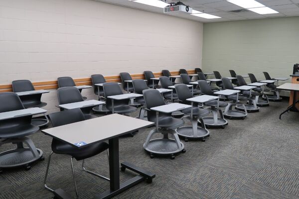 Back of room view of student tablet arm seating 