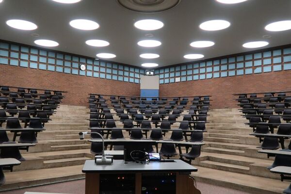 Back of room view of student attached bench seating