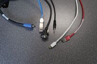 Pedestal - laptop cable connections with cables pulled out showing cable ends