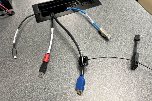 Pedestal - laptop cable connections with cables pulled out showing cable ends