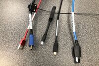 Pedestal - laptop cable connections with cables pulled out showing cable ends