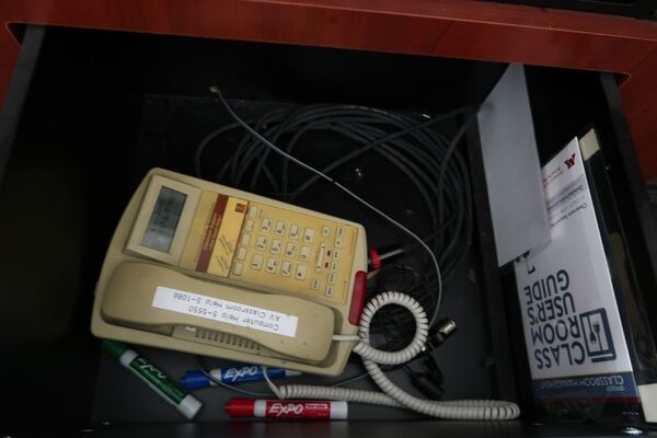 Pedestal - inside view of drawer showing telephone