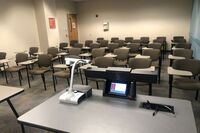 Back of room view of student tablet arm seating 