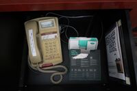 Pedestal - inside view of drawer showing telephone