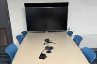 Group seating with connections for student provided laptops and push-to-talk microphone.