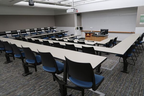 Front of room view with lectern center in front of markerboard