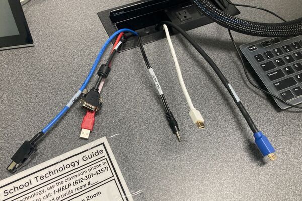 Pedestal - laptop cable connections with cables pulled out showing cable ends