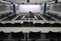 Front of room view with lectern center in front of markerboard