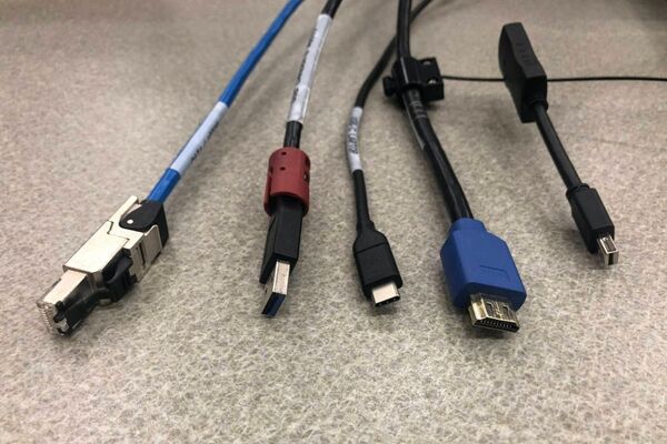 Pedestal - laptop cable connections with cables pulled out showing cable ends