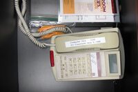 Pedestal - inside view of drawer showing telephone