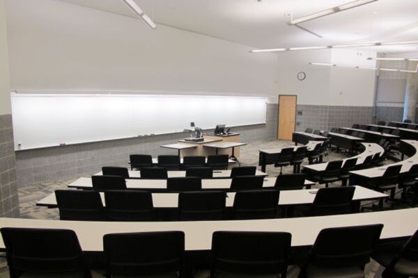 Front of room view with lectern center in front of markerboard 