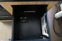 Pedestal - inside view of drawer showing two wireless mics in charging base