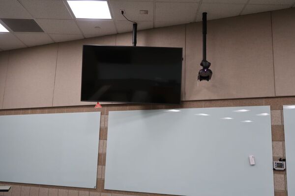 Monitor mounted so that students will be able to see remote participants without having to turn to look at the projection screen