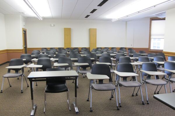 Back of room view of student tablet arm seating 