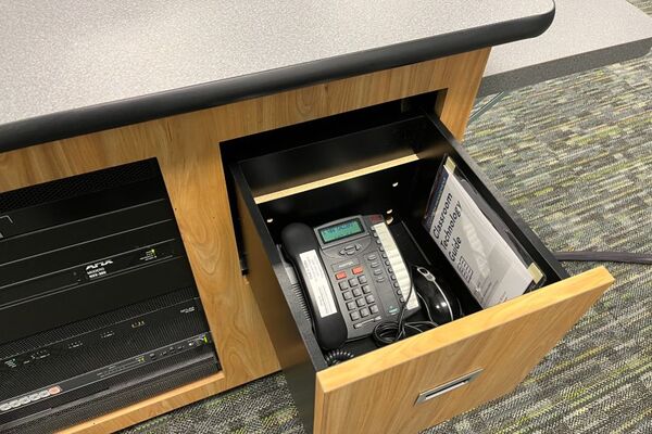 Pedestal - inside view of drawer showing telephone