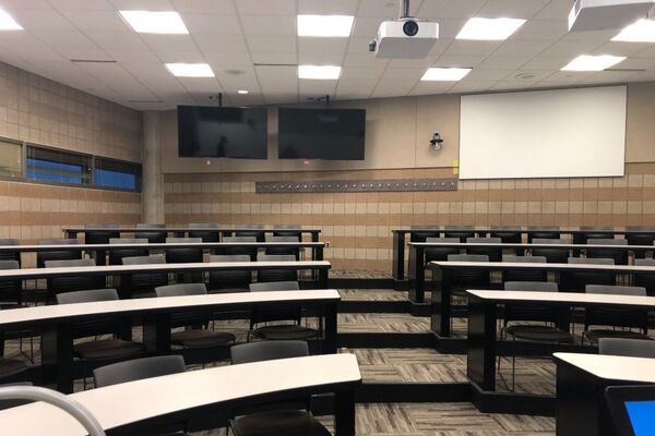 Monitor mounted in back of room so that the instructor will be able to see the presentation being displayed without having to turn to look at the projection screen