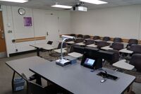 Back of room view of student tablet arm seating