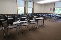 Back of room view of student tablet arm seating 