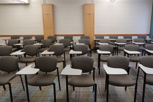 Back of room view of student tablet arm seating 