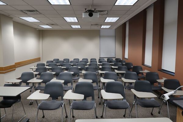 Back of room view of student tablet arm seating 