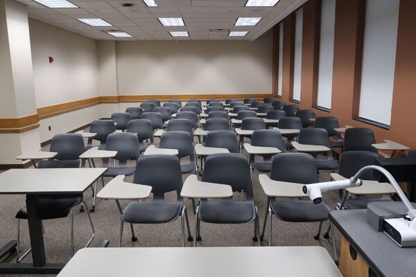 Back of room view of student tablet arm seating 