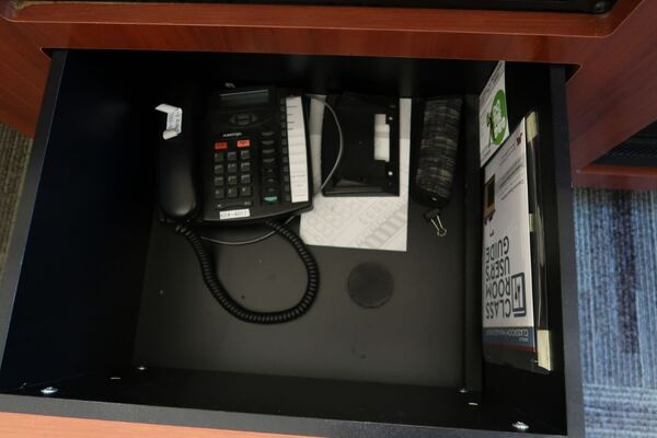 Pedestal - inside view of drawer showing telephone