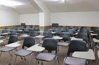 Back of room view of student tablet arm seating 