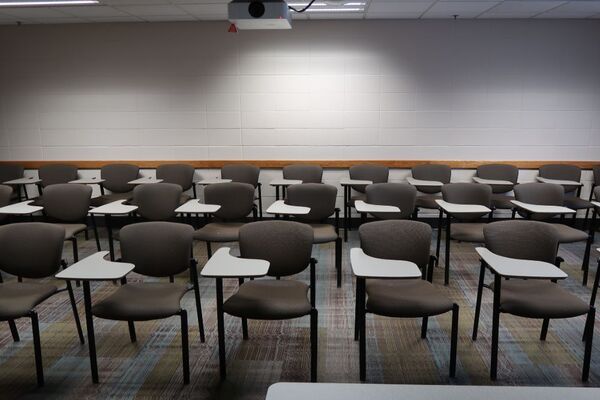 Back of room view of student tablet arm seating