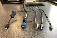 Pedestal - laptop cable connections with cables pulled out showing cable ends