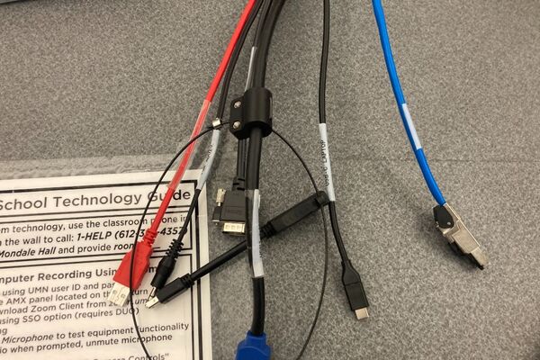 Pedestal - laptop cable connections with cables pulled out showing cable ends