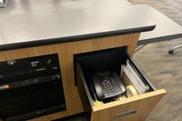 Pedestal - inside view of drawer showing telephone