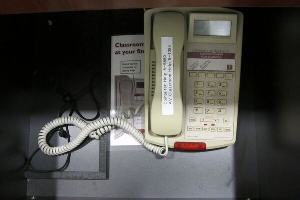 Pedestal - inside view of drawer showing telephone