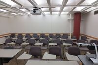 Back of room view of student tablet arm seating 