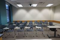 Back of room view of student tablet arm seating 