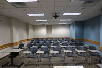 Back of room view of student tablet arm seating