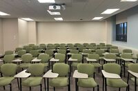 Back of room view of student tablet arm seating 