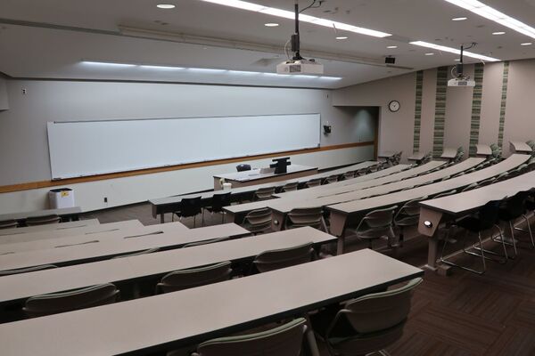 Front of room view with lectern center in front of markerboard 