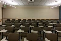 Back of room view of student tablet arm seating