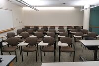 Back of room view of student tablet arm seating 