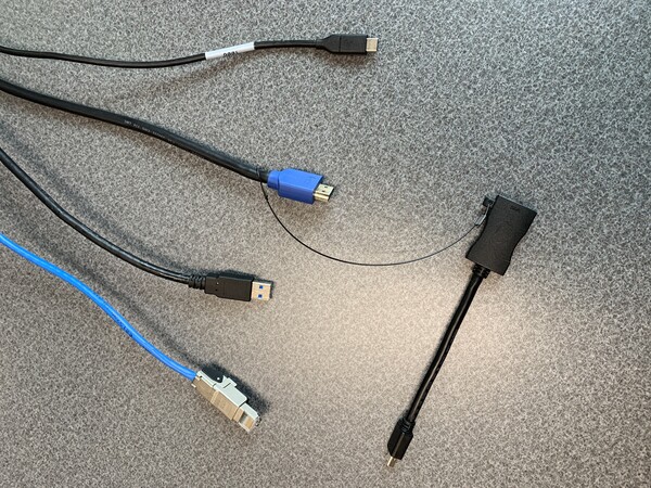 Pedestal - laptop cable connections with cables pulled out showing cable ends