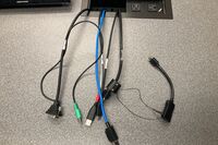 Pedestal - laptop cable connections with cables pulled out showing cable ends