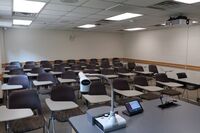 Back of room view of student tablet arm seating